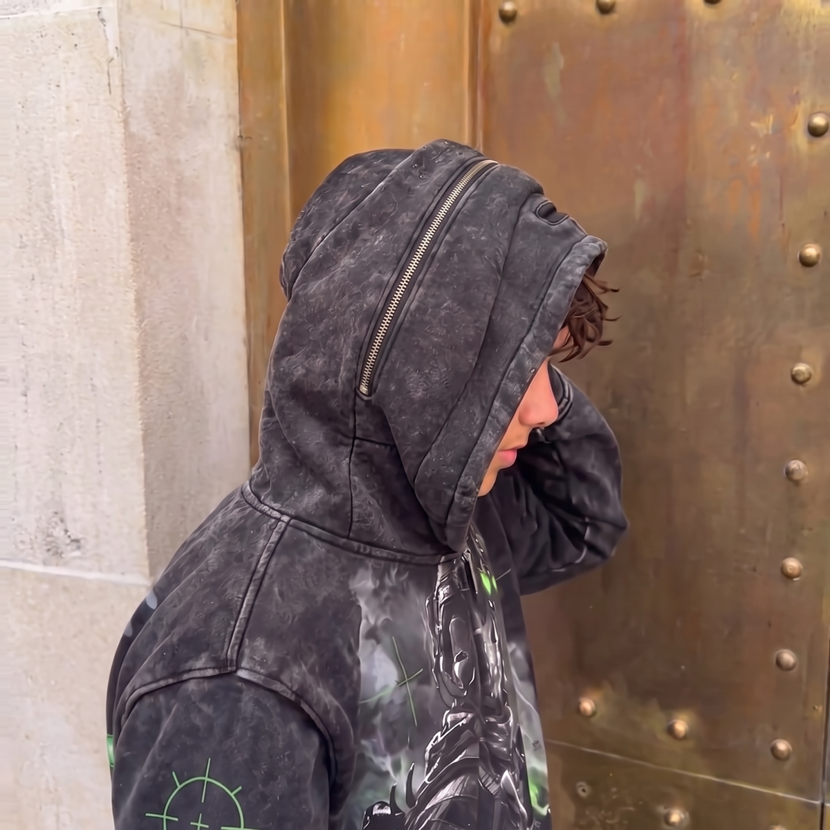 Ghost Comms hoodie worn outdoors